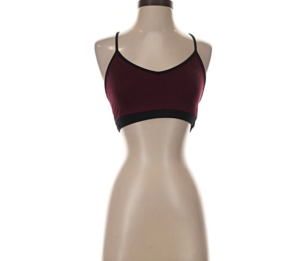 $72 Varley burgundy  piping burgundy sports bra with black trim, size L.